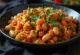 Чакалака с помидорами, поданная с овощами и специями